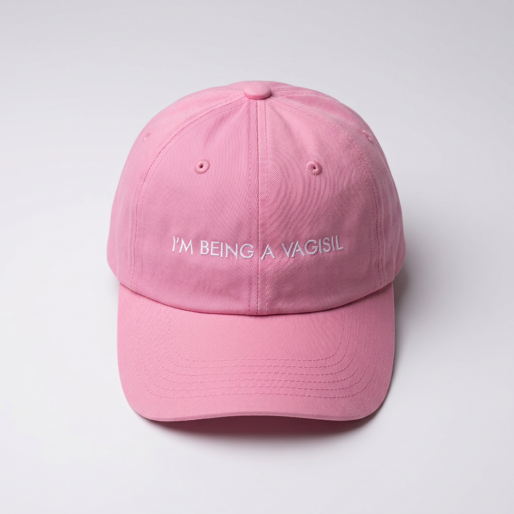 Pink cap with I'M BEING A VAGISIL text on a white backgroun